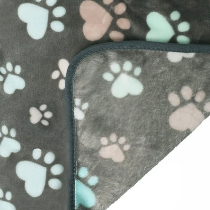 Chien couché sur la couverture épaisse double face noire